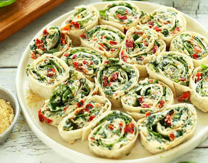 Sun-Dried Tomato and Basil Pinwheels – By the Recipes